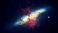 Красная спиральная галактика