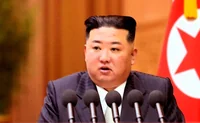 Ким Чен Ын выступает